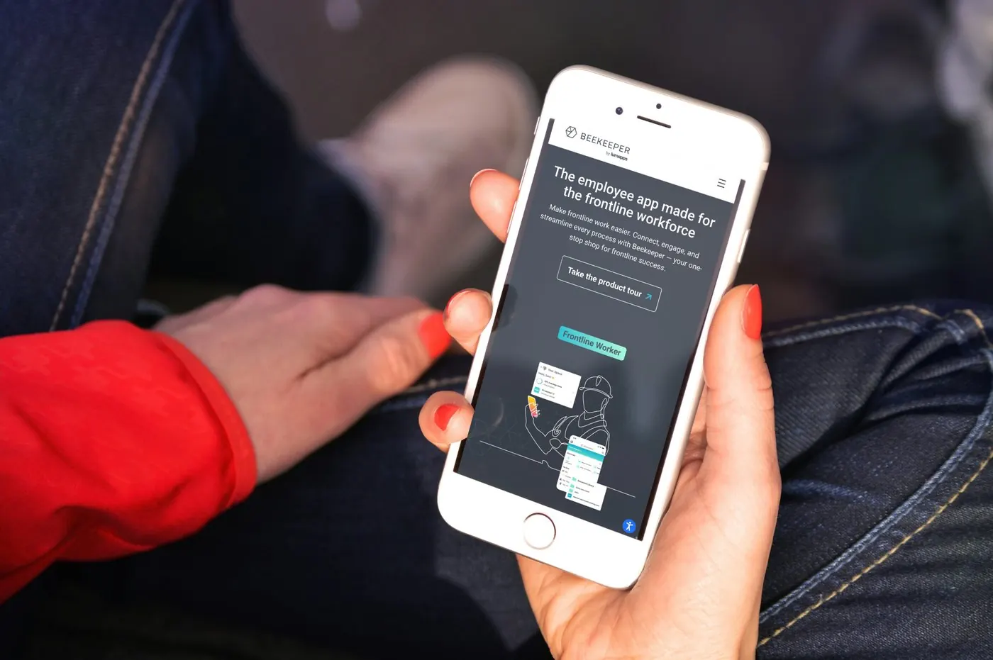Frontline worker using the Beekeeper mobile app to search a massive content library